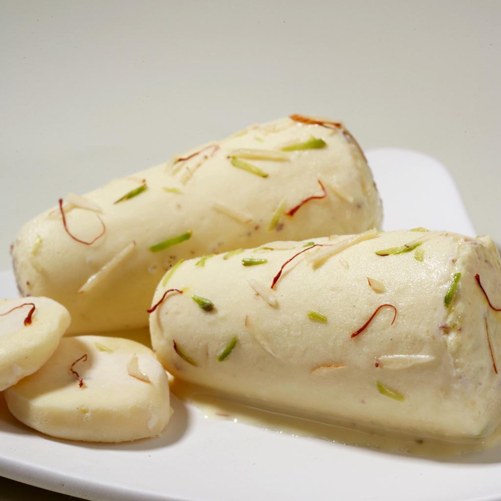 putting kulfi in a plate 